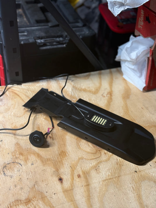 Surron Lbx plug n play rocklight (pre mounted on the plastic piece under the seat and switch for the ignition)